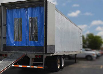 Trailer curtains help form a barrier between the cool air within the trailer and the warm, humid outside air