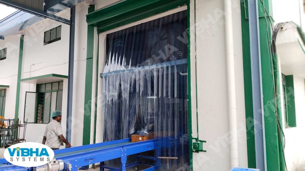 PVC strip curtains installed at a busy warehouse dock entrance