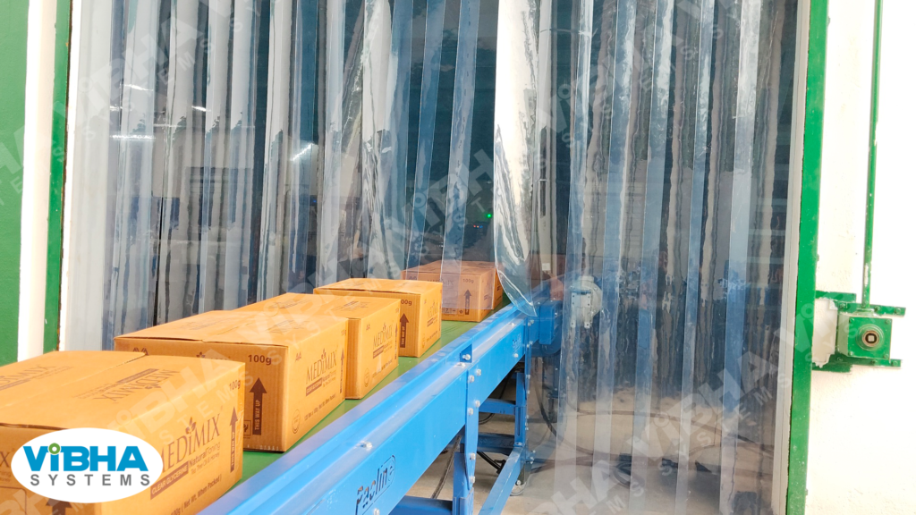 Transparent PVC strip curtains in use at warehouse loading dock