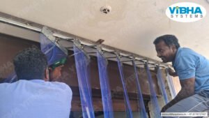 PVC strip curtain installation in Bangalore industrial spaces.