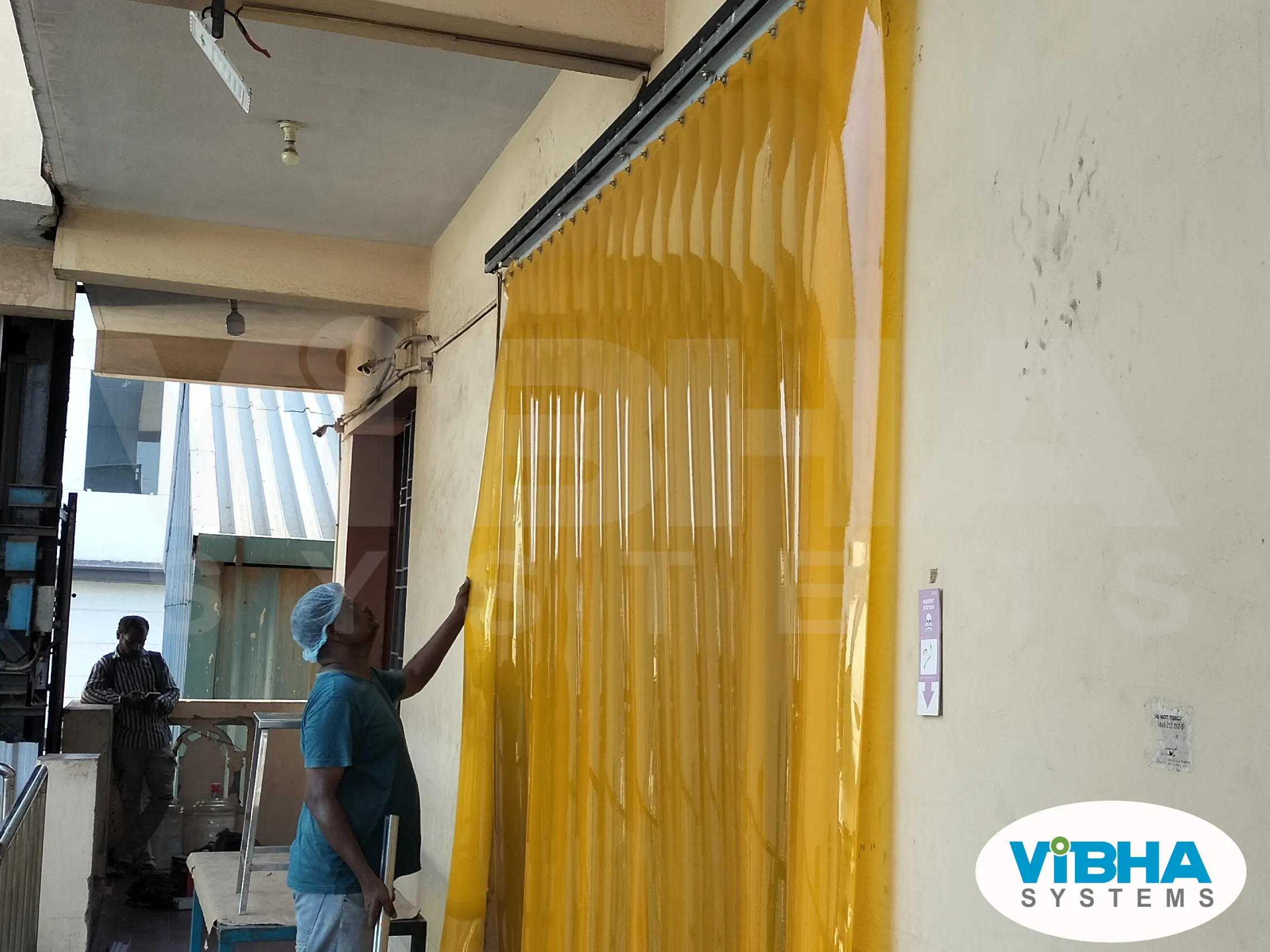 Insect amber PVC strip curtains in a Chennai food processing plant for pest control and hygiene