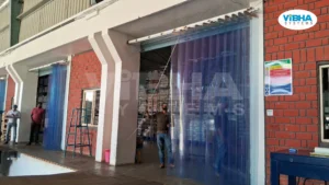 Sliding PVC strip curtains installed at a warehouse dock for easy access and temperature control.